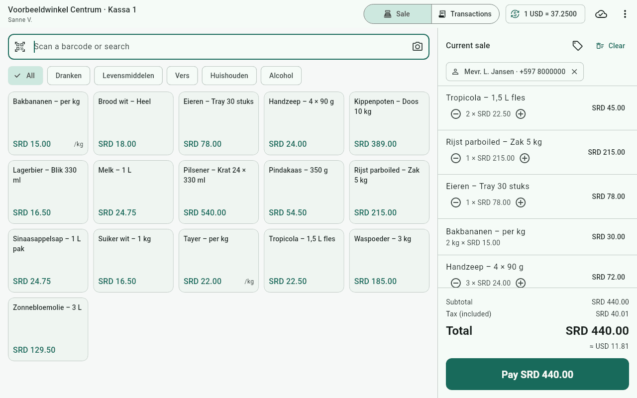 The CorePOS till with example products on the left and the current sale on the right, with the total in SRD and USD